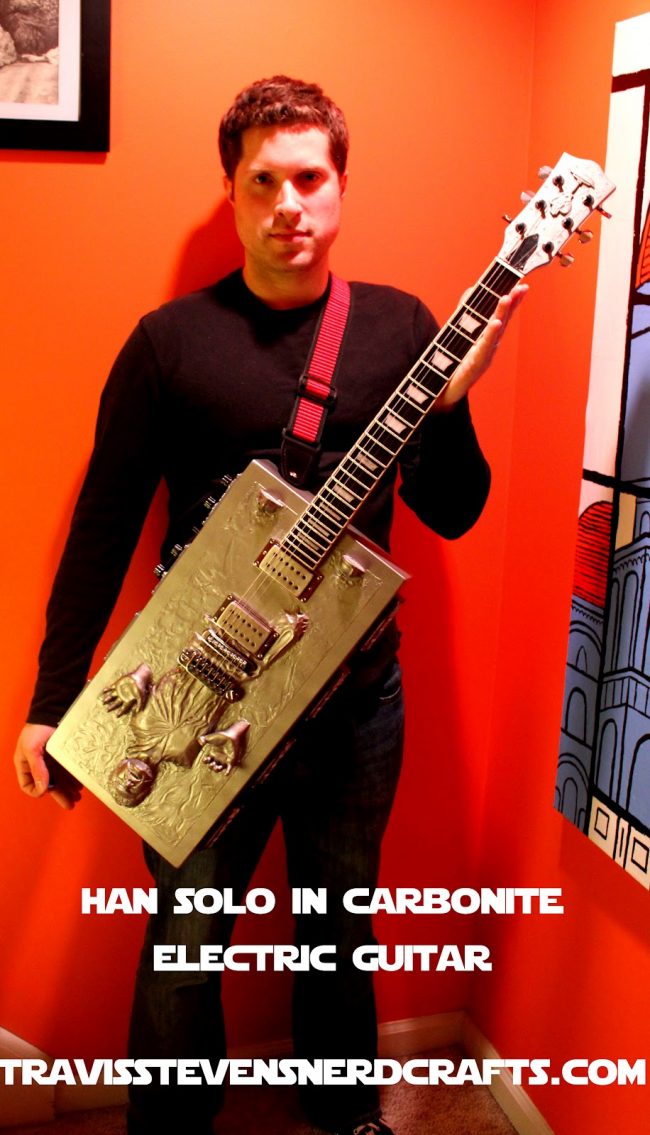 han solo carbonite guitar playing 650x1135 Han Solo in Carbonite Electric Guitar