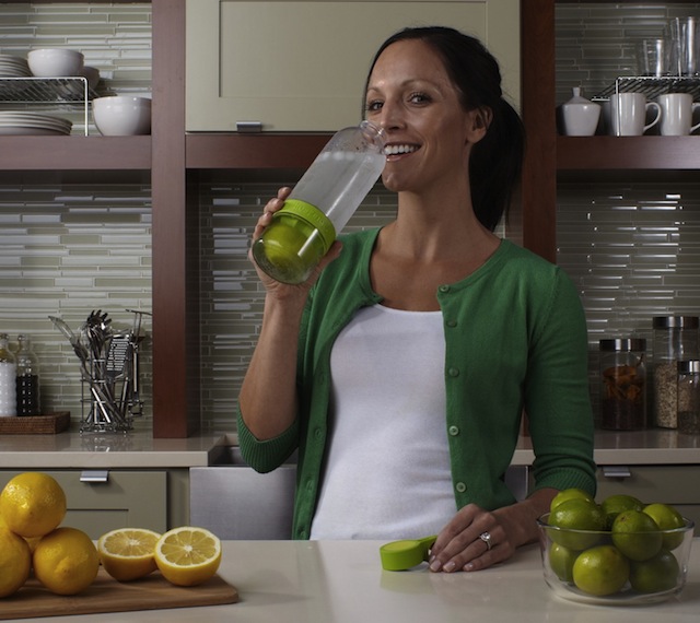 citrus zinger in use Water Bottle with Built in Citrus Juicer