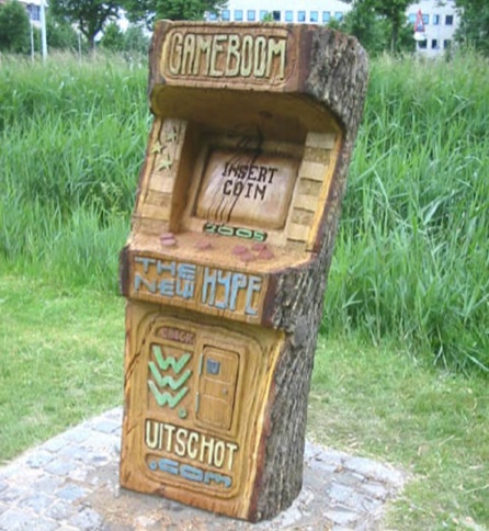 Video Game Cabinet Carved out of Tree Trunk